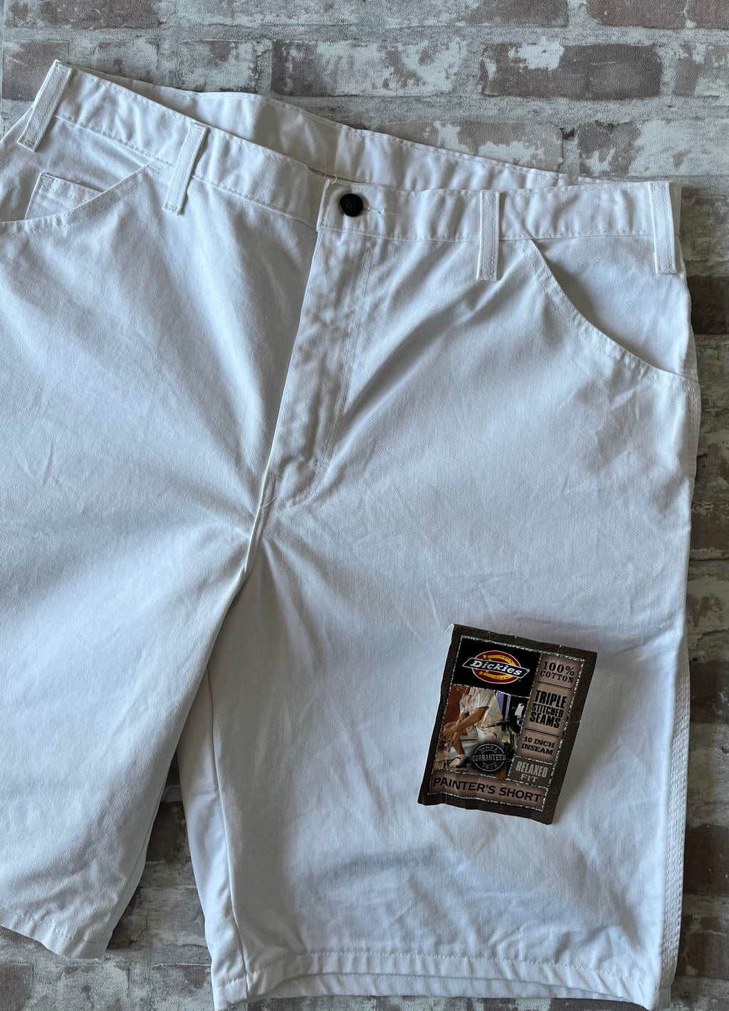Short de peintre blanc Dickies vintage en coton drill avec boucle marteau et surpiqûres, présenté à plat avec étiquette