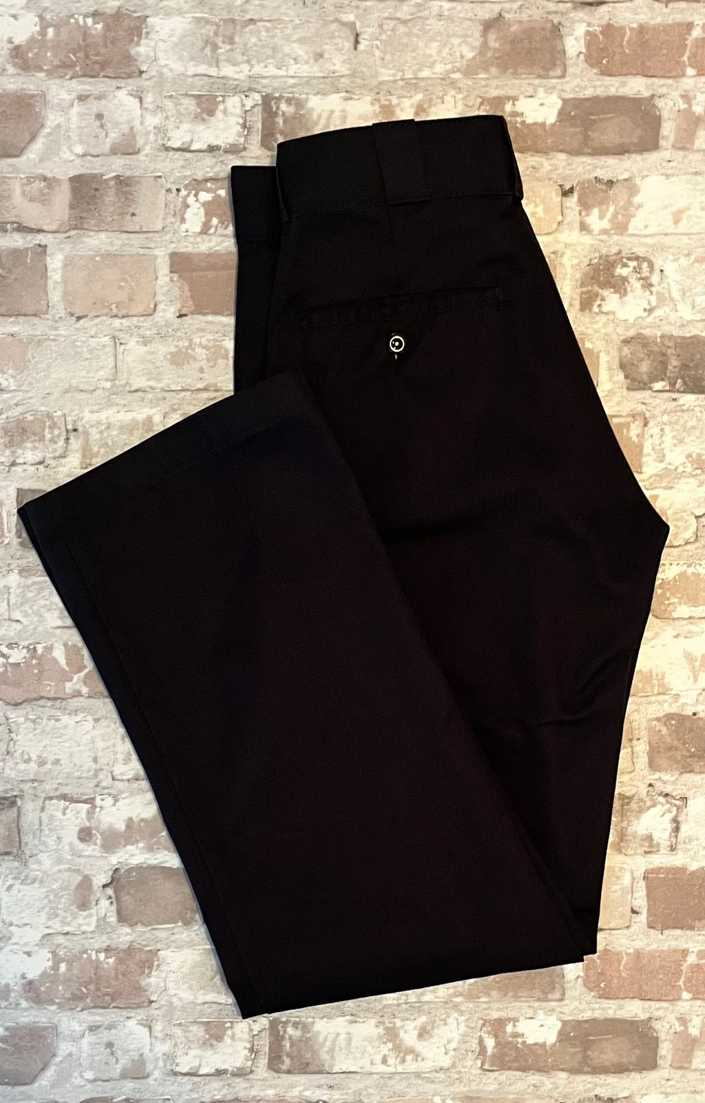Pantalon de travail Dickies 874 Original Fit noir rigide à pli permanent, présenté plié à plat.