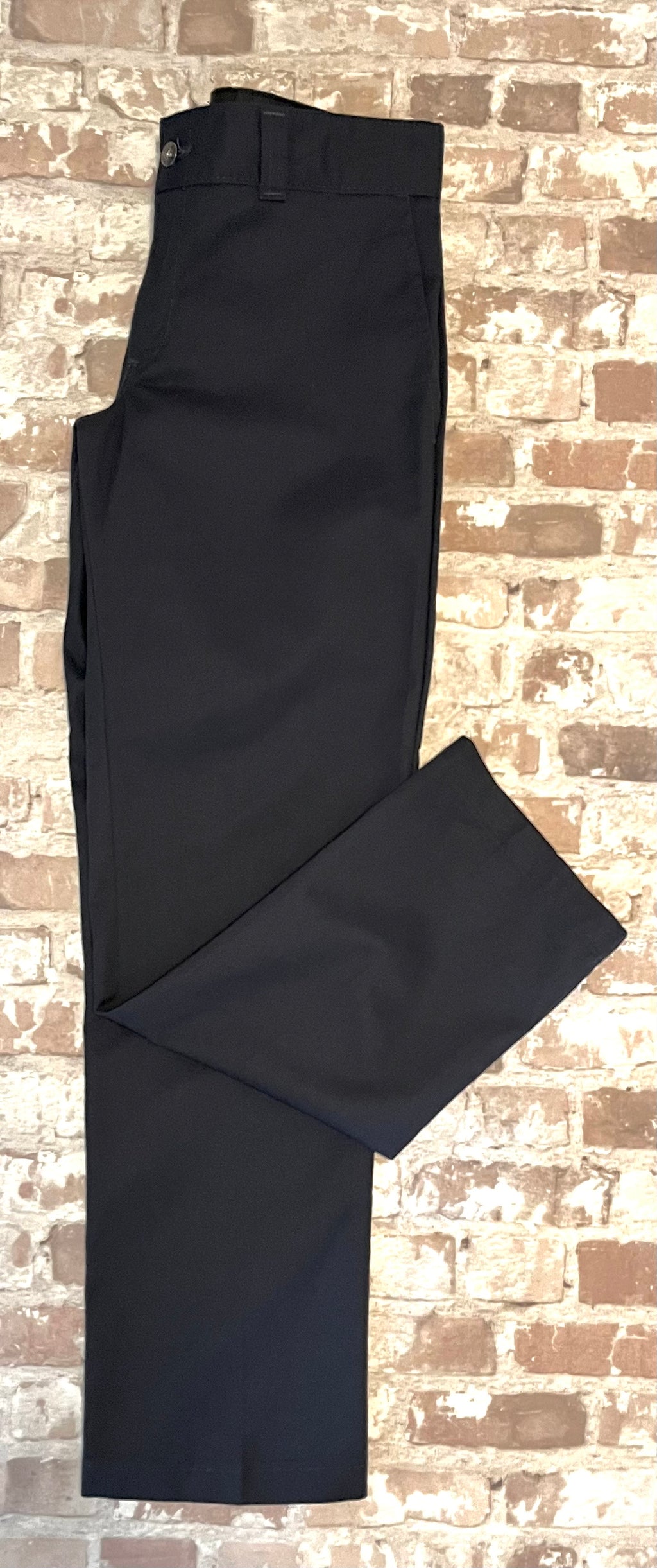 Pantalon coupe slim bleu nuit Dickies Flex avec pli central permanent, présenté à plat