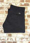 Pantalon coupe slim bleu nuit Dickies Flex avec pli central permanent, présenté à plat , plié