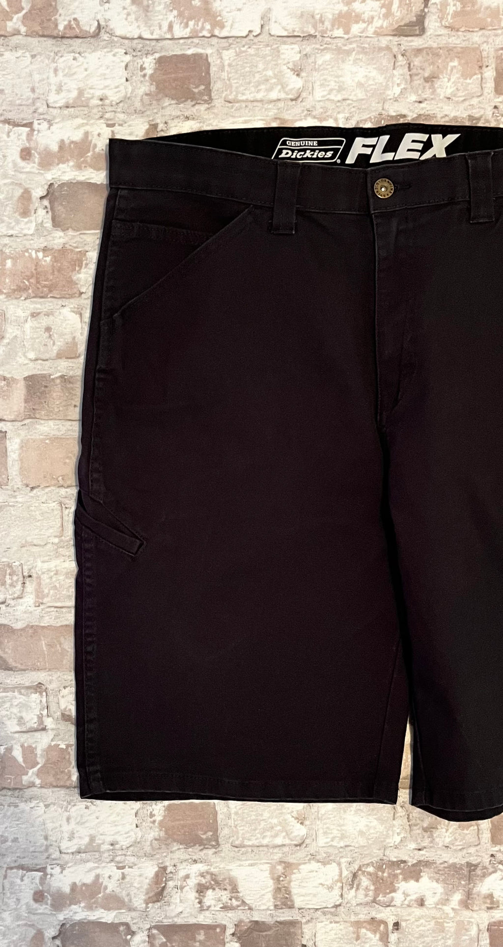 Short en toile de coton épais noir Dickies Heavy Cotton Canvas avec coupe droite décontractée, présenté à plat de face.