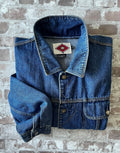 Veste en jean vintage Horizons Outerwear des années 90 de style chore jacket en denim bleu délavé, présentée pliée à plat